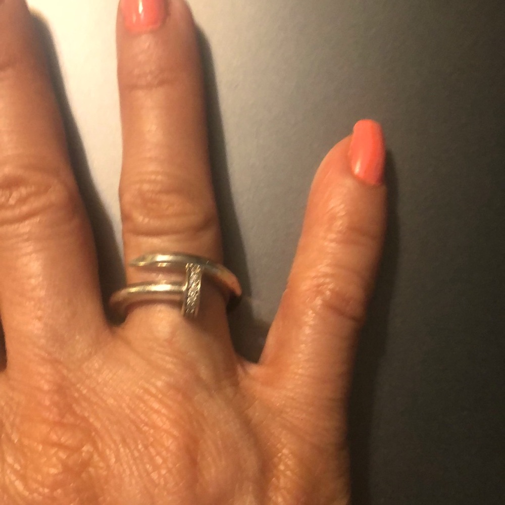 Sterling silver nail ring with CZ’s on nail head.